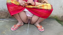 Wonderful pissing Village outside xxx Thumb