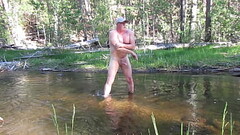 Naked bathing in the river. Thumb