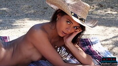 Petite Asian teen Hannah Le gets naked on a relaxing ranch for Playboy Thumb