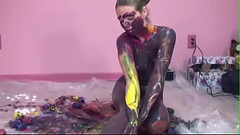 Small-titty slut gets messy with paint in room Thumb