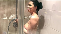 Things get hot in the shower with busty MILF Kira Queen Thumb