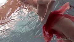 Katya Okuneva strips in her red lingerie underwater Thumb