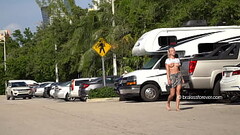 Flashing her big tits in the parking lot Thumb