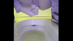 Asian teen pee in toilet 3 Thumb